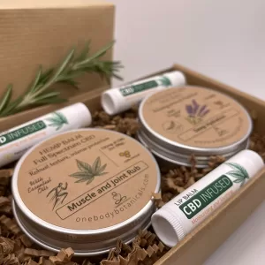 Two 2oz cans of Hemp Balm - Full Spectrum CBD and Lavender Bliss Skin Balm along with 3 CBD Infused Lip Balm for all in one CBD gift set for yourself or someone else