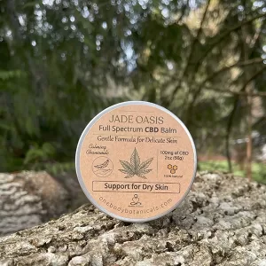 2oz can of Jade Oasis - Full Spectrum CBD Skin Balm, Gentle Formula for Delicate Skin. Made with Chamomile and Calendula Oil and added Frankincense Essential Oil. OneBody Botanicals